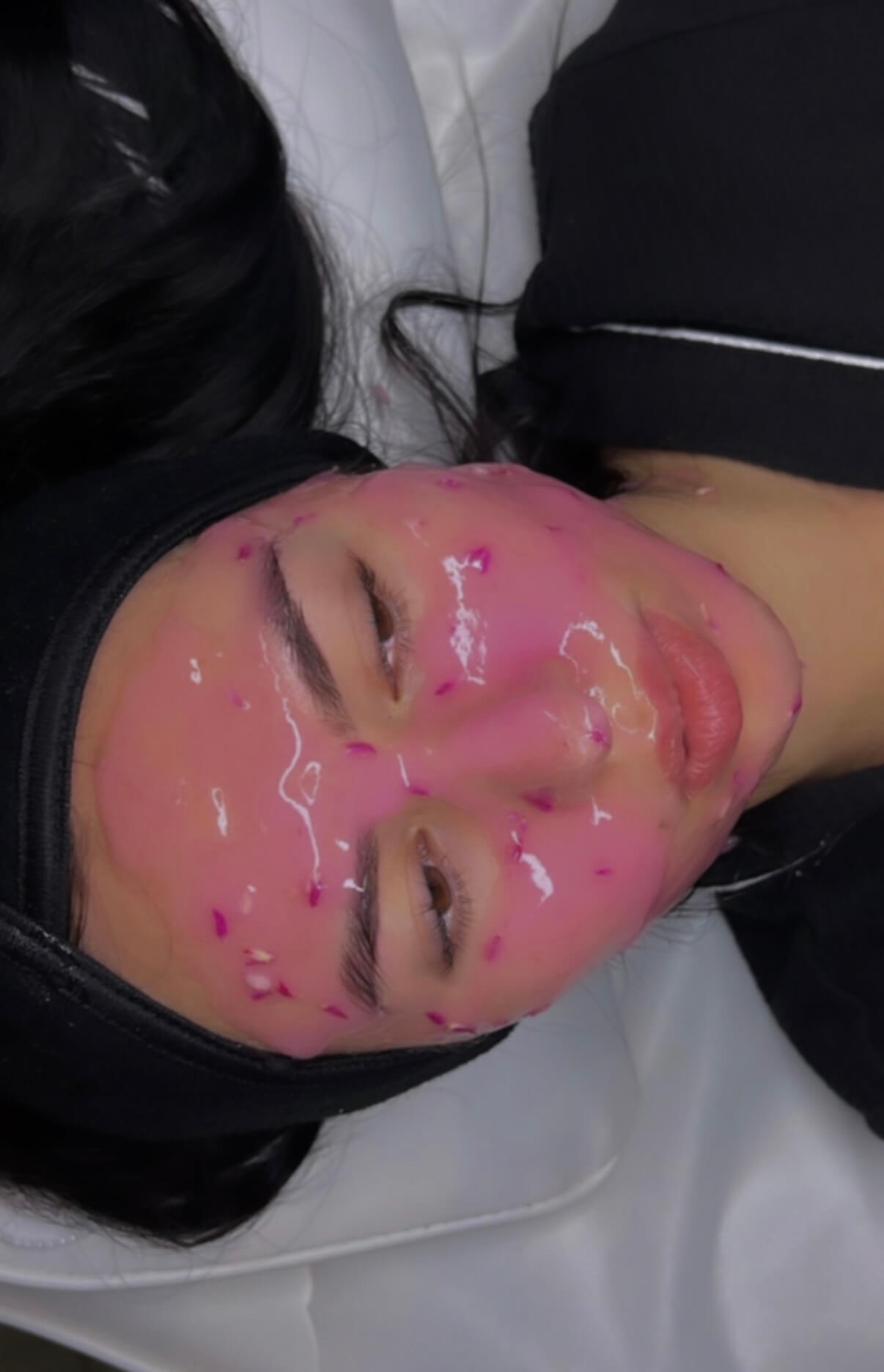 Professional facial treatment in progress