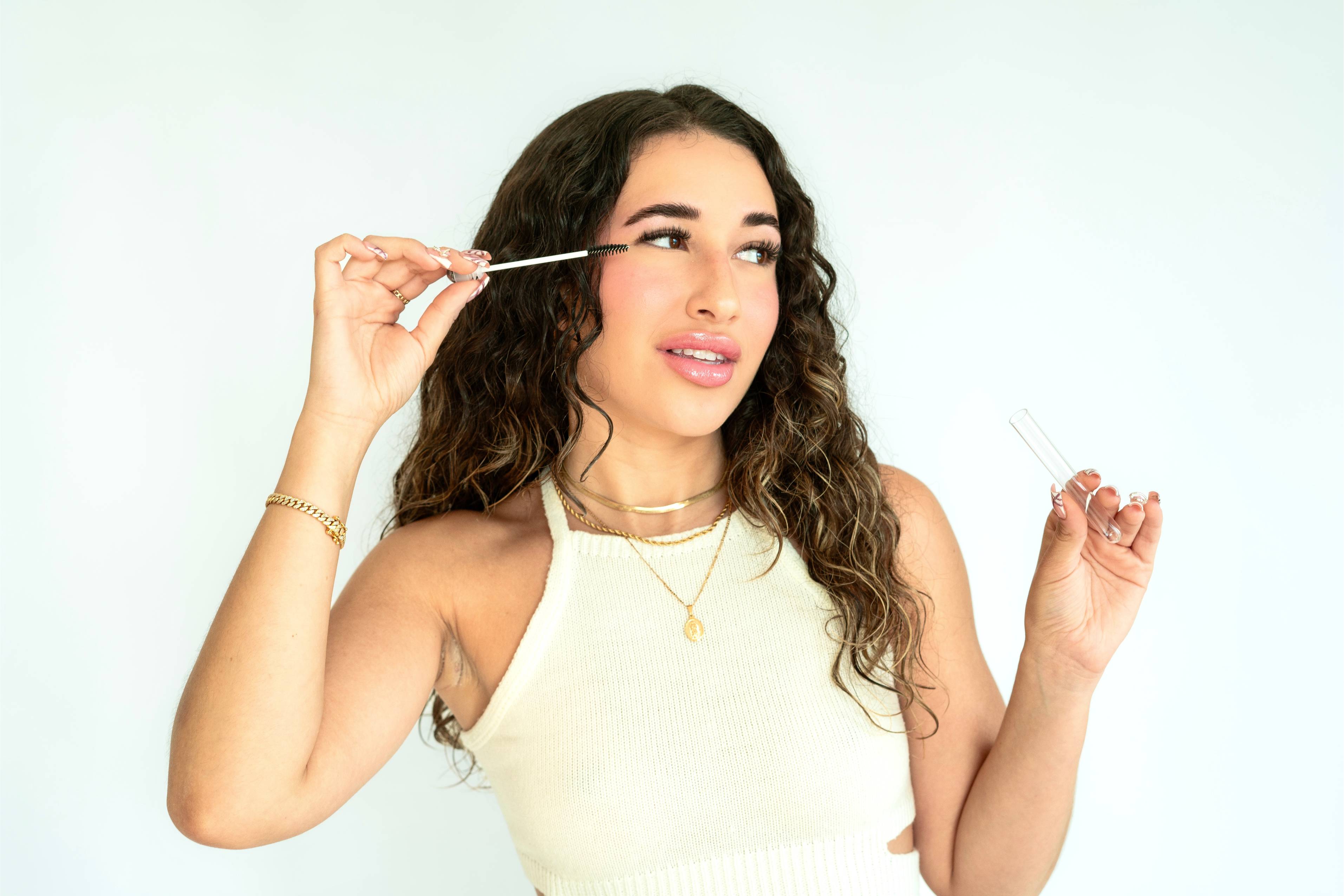 Woman receiving lash extensions